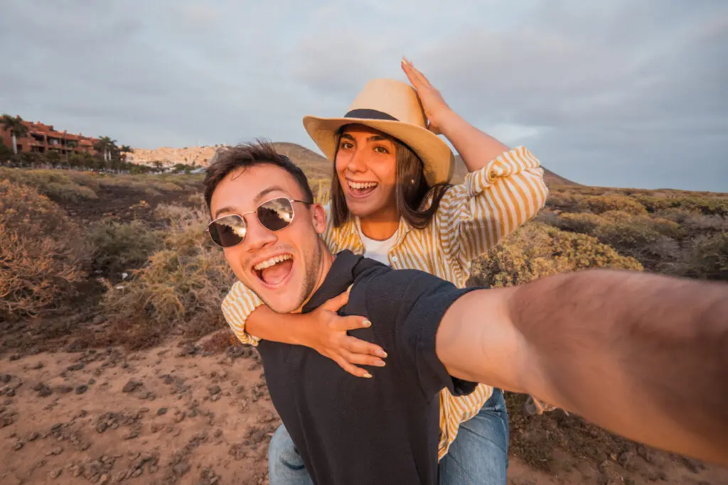 Couple taking a candid selfie to share in their Heart to Heart adoptive family profile.